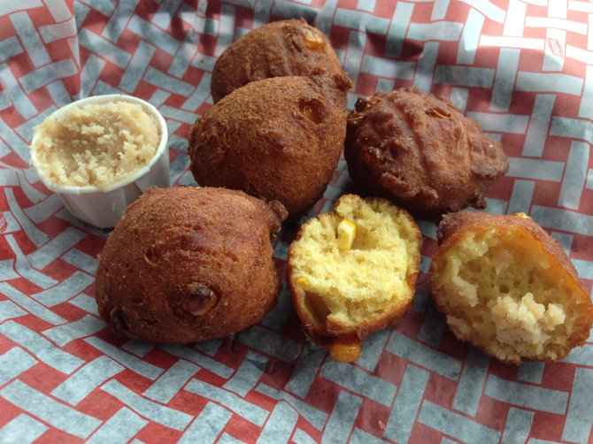Corn fritters with cinnamon honey butter at Lil' Piggy's Bar-B-Q