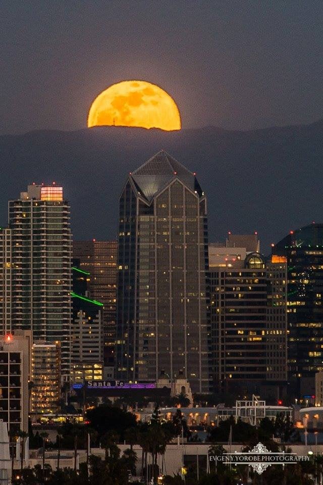 Huge Full Moon over Downtown by Evgeny Yorobe