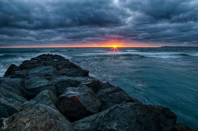 Sunset on a cloudy day by T. Sutlick Photography