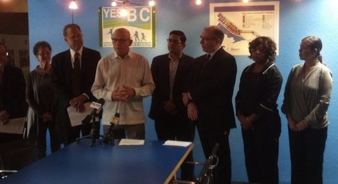 Mark Steele (center) flanked by business community supporters of Barrio Logan community plan update
