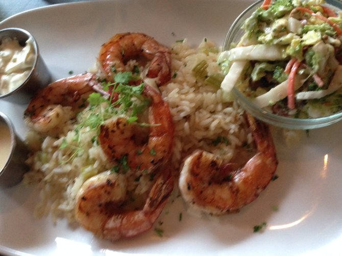 Grilled shrimp with rice and broccoli slaw at Spike Africa's.