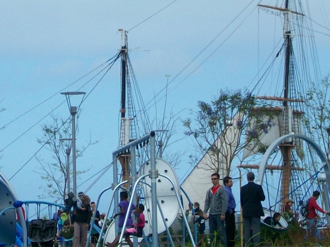 New Waterfront Park playground with Star of India ship sails towering in the downtown San Diego background.
