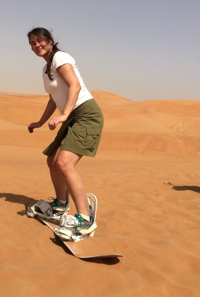Debra Schroeder sandboarding in Dubai
