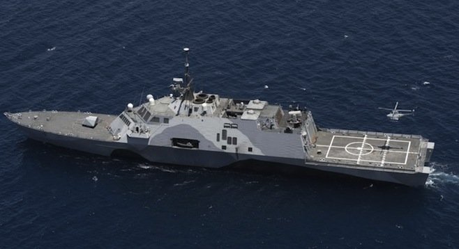 Fire Scout drone copter taking off from the USS Freedom