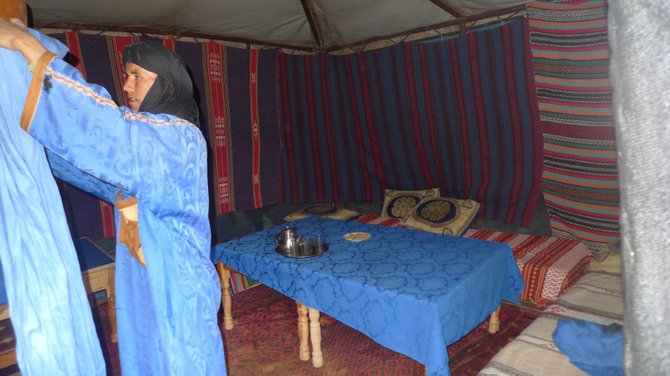 Omar prepares the dining tent.