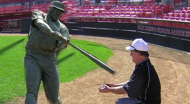 Tony Gwynn statue consults with SDSU batting coach Slappy Smith on proper form.