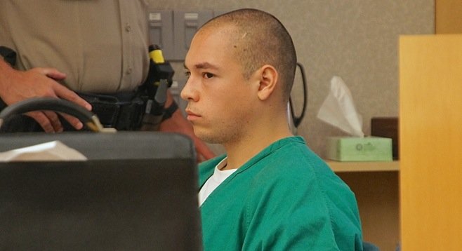 Anthony Fernando Garcia, 20, listening to testimony against him last September. Photo by Eva