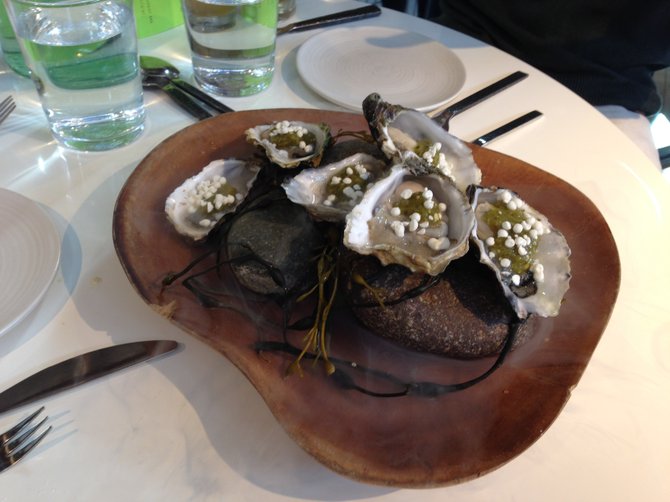 Carlsbad oysters with horseradish pearls and charred tomatillo sauce at Juniper And Ivy