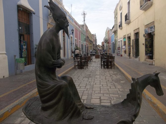 Art and sidewalk cafes in Campeche's colorful old town.  