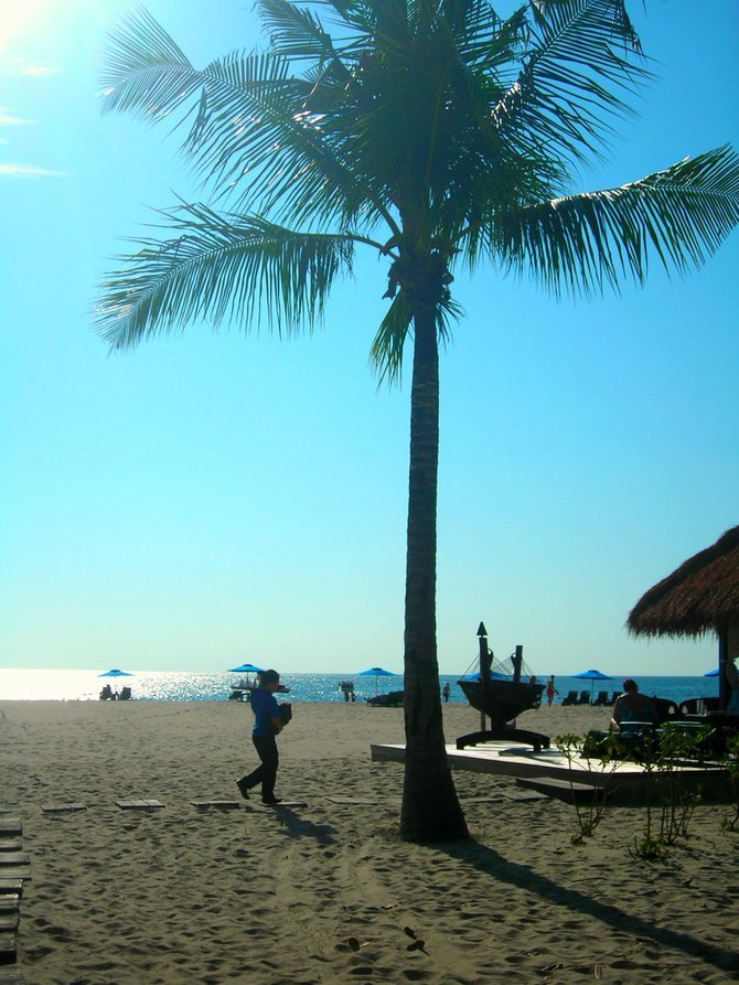 Sun-dappled moments at Pantai Dalit Beach.