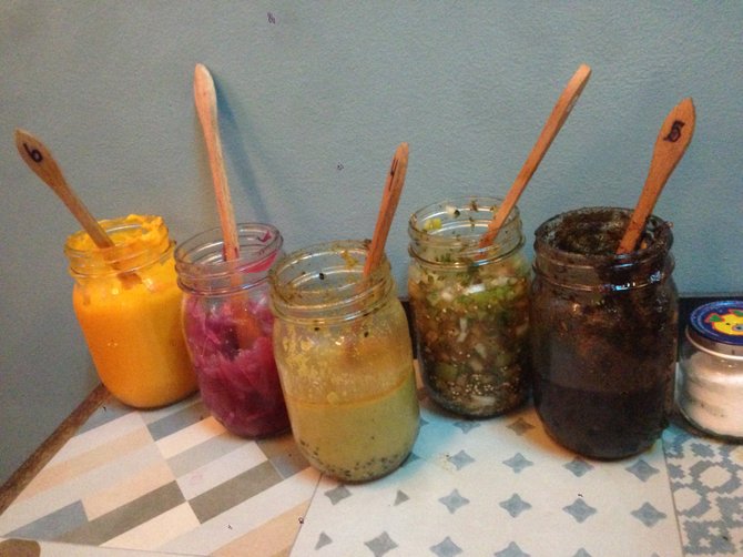Salsa lineup (L-R): carrot & habañero, pickled onions, sesame seed, chunky tomatillo, mixed nut. Pineapple not pictured.