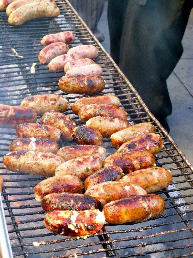 Sausages being grilled at Sausage Fest, an annual cooking contest scheduled for July 16 at Hotel Solamar.