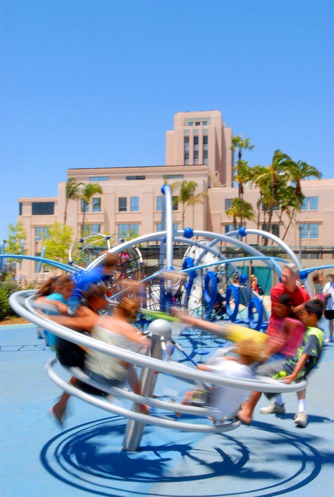 Children play at the new Waterfront County Park in Harbor Drive