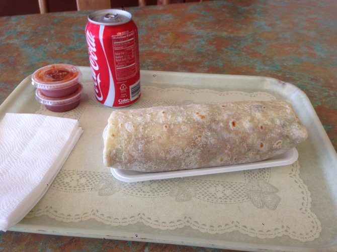 Might look better in a foil wrapper. Chile relleno burrito, add rice and carnitas. Los Reyes.