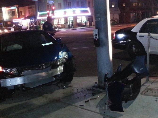 Car hits light pole across from Giant Dipper rollercoaster