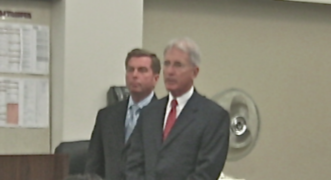 Cartmill (left) with attorney Thomas Warwick on April 24, 2014 