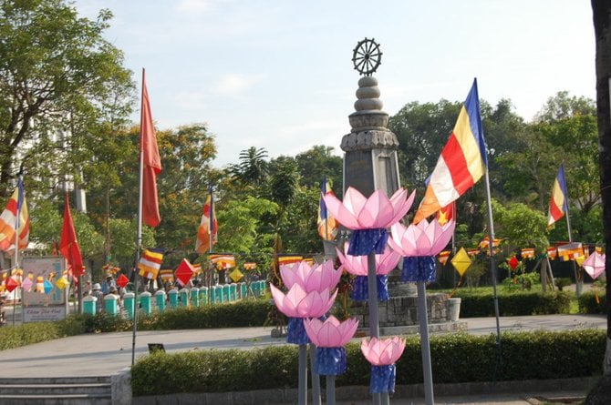 Giant manmade violet lotuses are displayed to  celebrate Buddha's birthday at Huế.