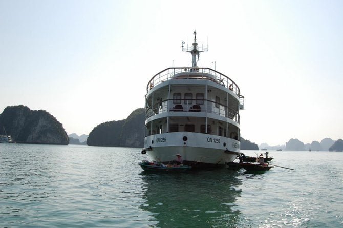 The Emeraude surrounded by sampans at Halong Bay.