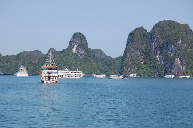 Boats at exquisite Halong Bay, which is in the Gulf of Tonkin, where an "incident"  Aug. 2-4, 1964 triggered the Vietnam War.