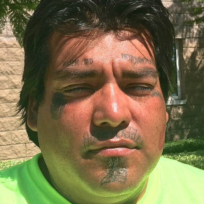 Juarez said he got those tattoos on his face while in prison. Photo by Eva