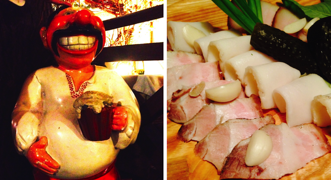 Left: Ukrainian cossack warrior statue greeting visitors entering the restaurant (maybe a retired one?); right: salo: pig fat, up close and personal, with meat, pickles and touches of garlic. Yumm....
