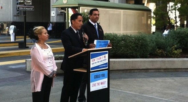 Todd Gloria, flanked by supporters of his "Live the Wage Challenge"