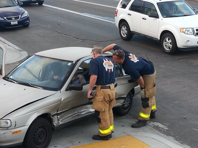 Firefighters use Jaws of Life to free driver pinned in car after accident in Pacific Beach