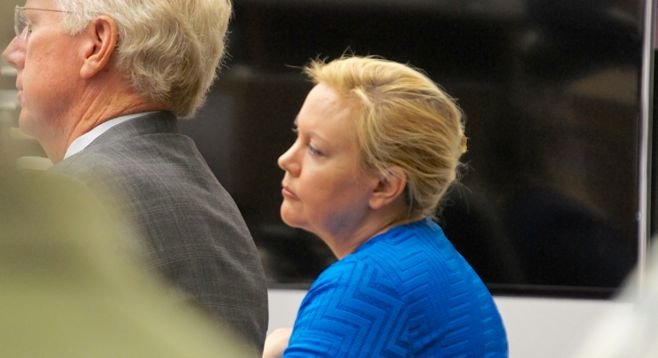 Atty Paul Pfingst and Julie Harper listen to Cihak testify. Photo by Eva