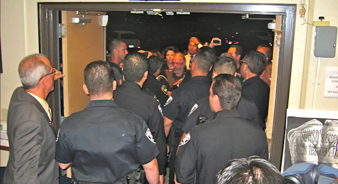 District boardmembers called on police to evict the public from an October 21, 2013, meeting.