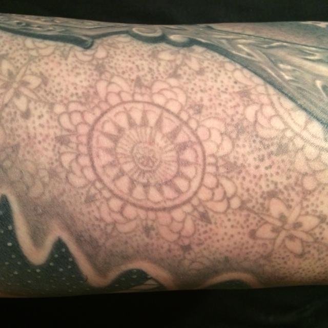 this is my vintage style lace tattoo by Tim Lees at Propaganda Tattoo on El Cajon Blvd
