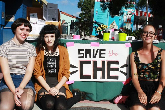 Lein Gage, Lora Mathis and Daliah Galvin collect signatures in an effort to keep the Che Café open.
