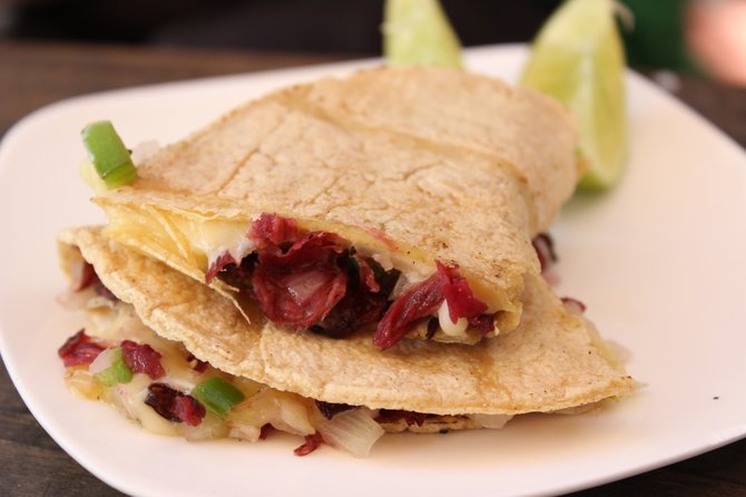 The tart quesadilla de la flor de jamaica, made with Oaxacan cheese and hibiscus flowers.