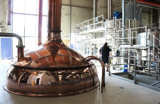 The brewery at Ballast Point Brewing & Spirits' new Miramar facility features a copper brewhouse reclaimed from a defunct brewery in Germany