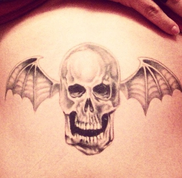 The best Death Bat I have ever seen tattooed, I am not just saying that because it's tattooed on me!! Avenged Sevenfold has to be one of my all time favorite bands, I live through music and I had to get this Death Bat! This tattoo was done by Karin Ackerman at Chrinic Tattoo in Pacific Beach. 