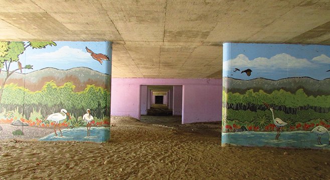 Murals located along the trail going under the roadway
