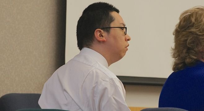 Bryan Chang listening to opening statements by attorneys, day one of his sanity trial. Photo by Eva