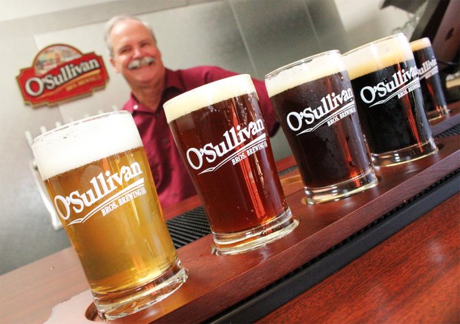 O'Sullivan Bros. Brewing Company owner Ed O'Sullivan serves up tasters of his Scripps Ranch brewery's beers - Image by @sdbeernews