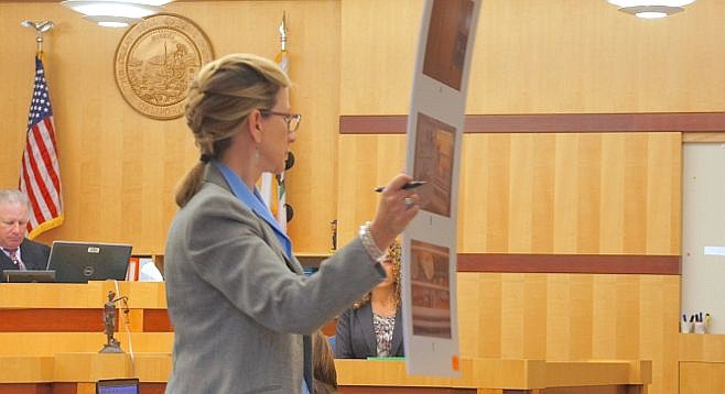Defense atty Kathleen Cannon showed photos of the refrigerator to the jury. Photo by Eva