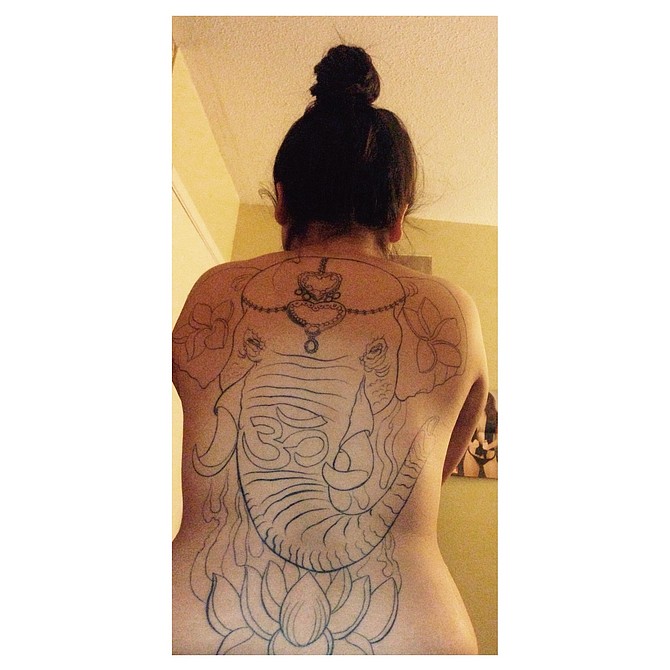 Stephanie's elephant: 
I got my elephant to represent myself as this beautiful stong being. I have always loved elephants and wanted to feel like I will always be as beautiful as they are. The OM symbol represents my love of chakra and open love 
