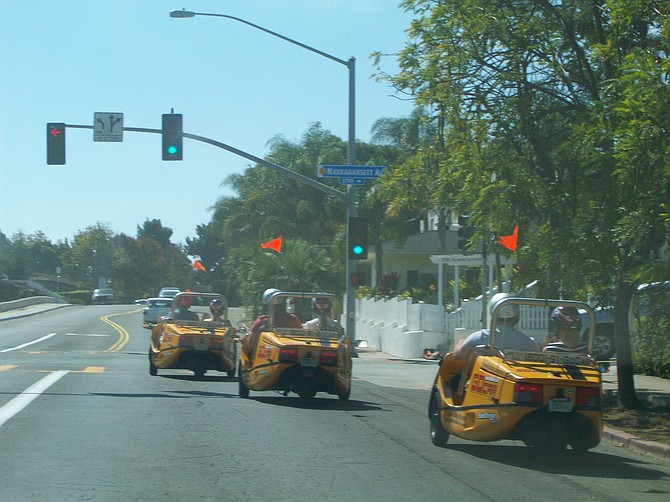 A Go Cars parade line up to clog traffic along Chatsworth Blvd. in Point Loma.