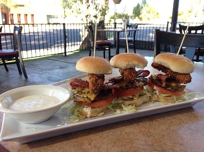 Fried Avocado Cheeseburger Sliders served with a bowl of ranch. Oh boy. Up the Hill Grill.