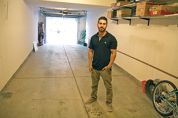 John Forouzandeh’s two-car garage can’t accommodate his three-car household.