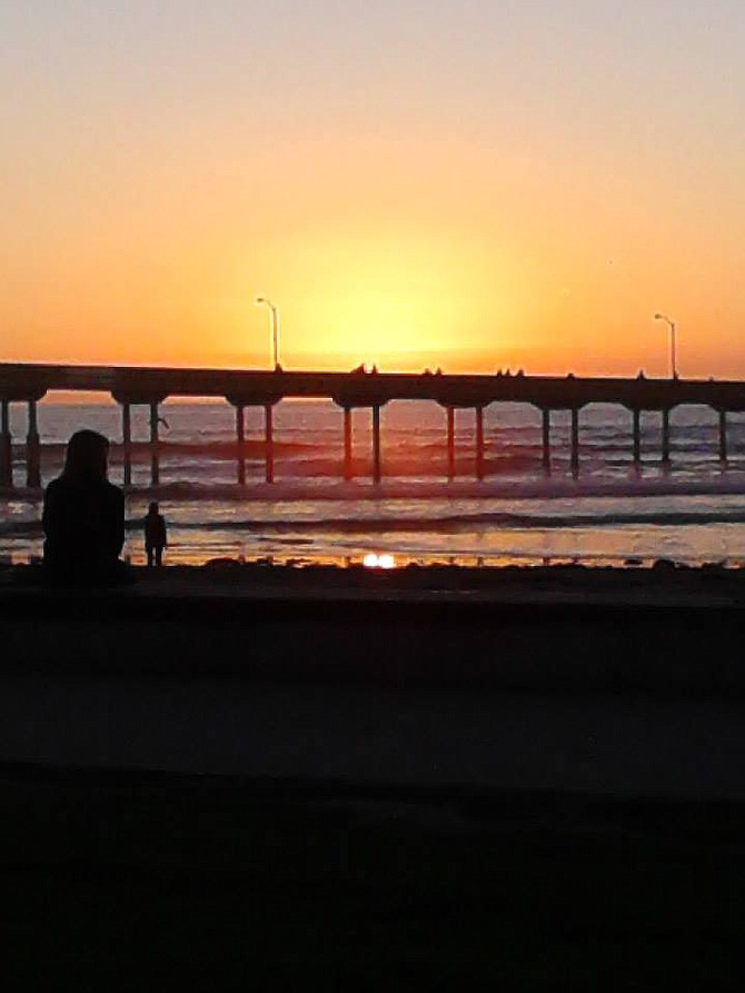 Sunset at Ocean Beach out by the Pier. 