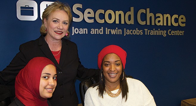 Trisha Gooch (center) with her colleagues at Second Chance