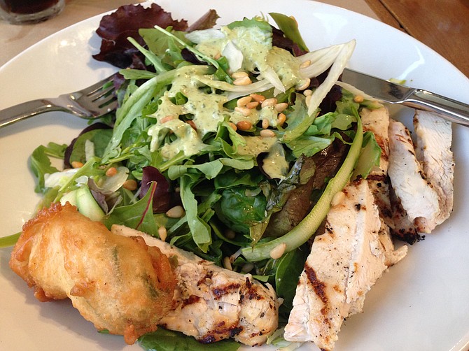 The Wonderful Green Salad with grilled chicken and a scrumptious goat-cheese stuffed squash blossom