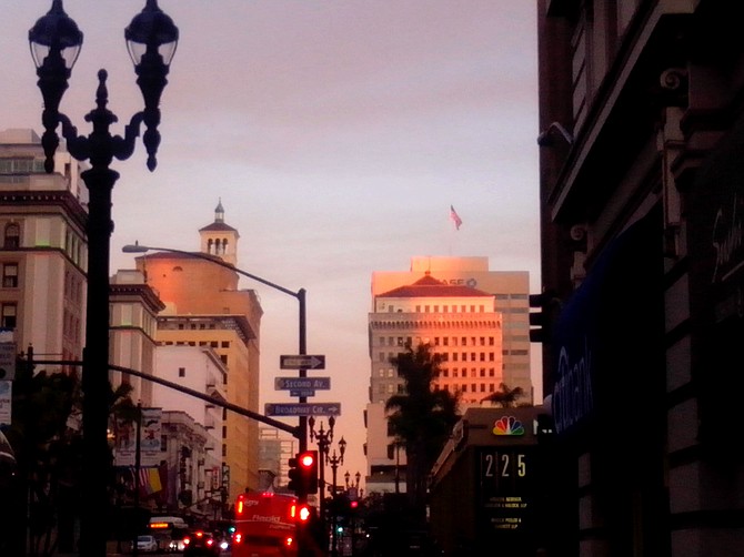 Light from the setting sun makes the high-rises of downtown San Diego glow. (Looking east on Broadway, THE US GRANT Hotel is on the left.)

Core-Columbia District
