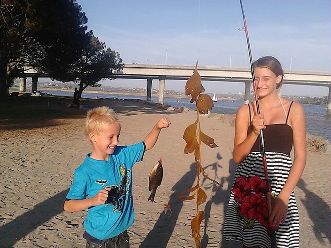 Cody's 8th Birthday caught a striped bass and some kelp!!! Mission Bay!