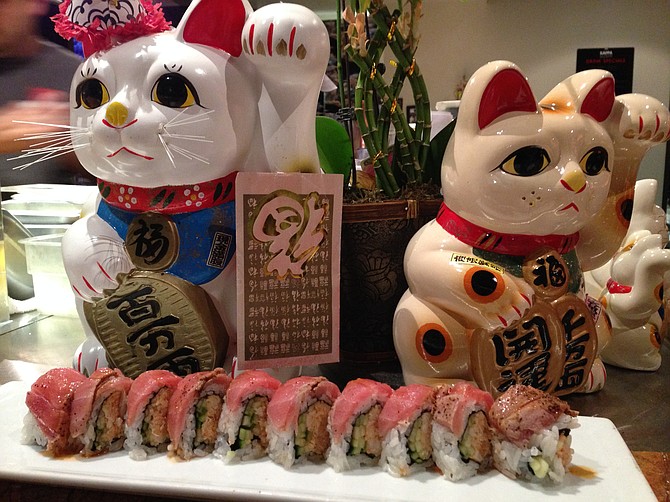 Couple of cat figurines and the El Diablo roll. Kappa Sushi.