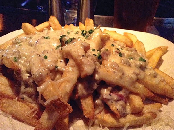 Quebec’s gastro-gift to the world, poutine, means “messy,” is messy. And tasty!