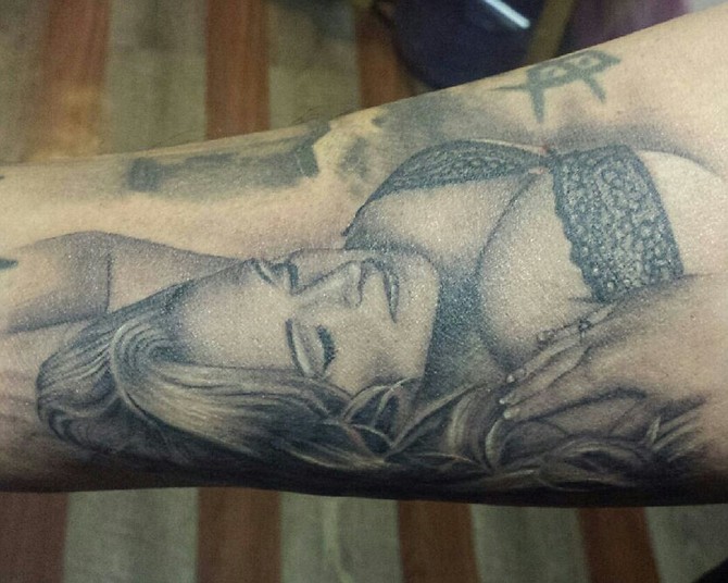 I got this tattoo here in San Diego from Tattoo Artist Checho at Nittis tattoo.
This is a portrait of my wife I met her 9 yrs ago we were homless at one point.Now we have beautiful home and daughter! This is a reminder of how Beautiful and Angelic she is and such a solid person. Always has my back!! Family First!!
